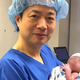 Dr. John Zhang holds Abrahim—the world’s first baby with three genetic parents. (Image: John Zhang/NHFC)